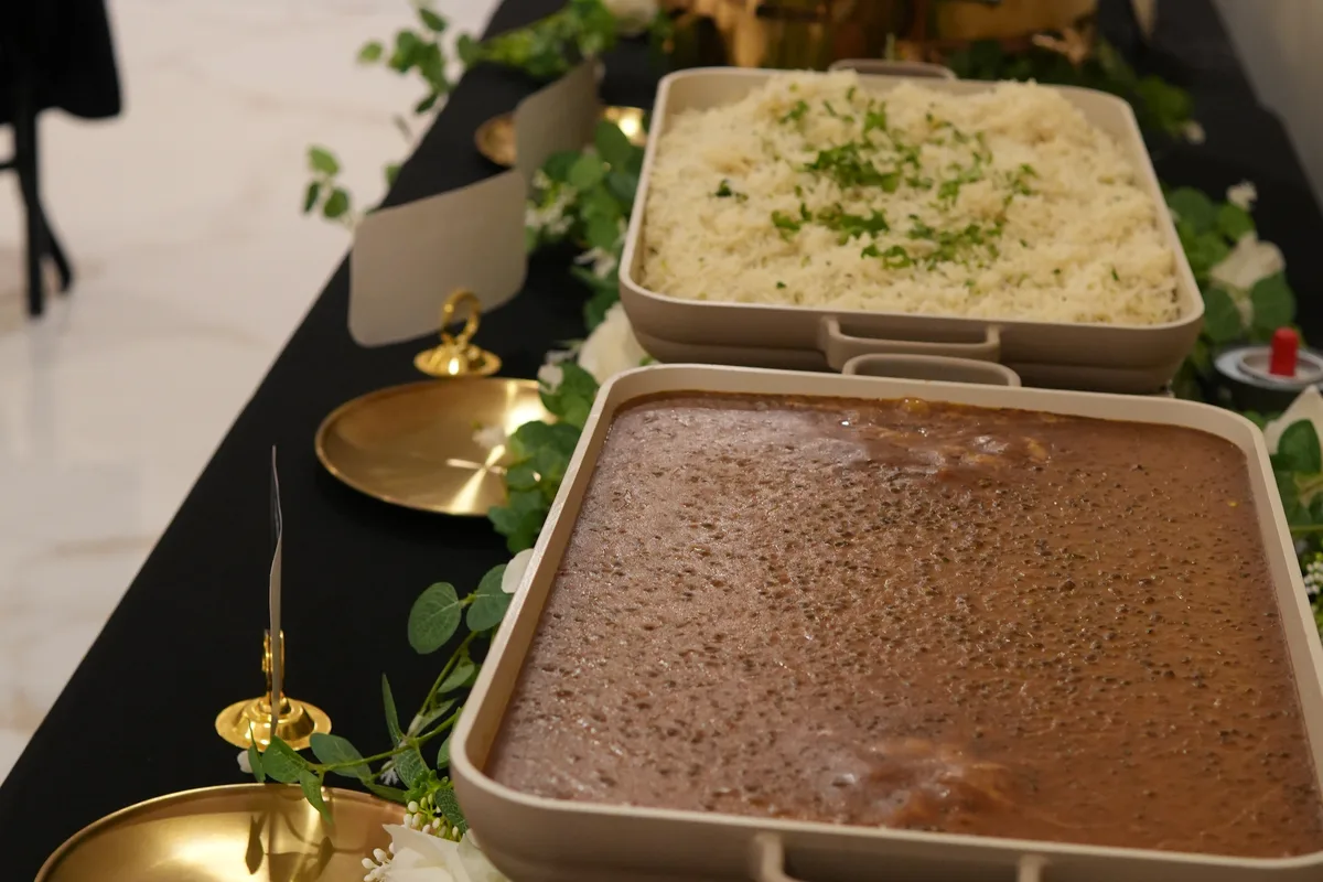 Elegant Indian catering buffet with rice, dal and chafing dishes by Mejwaani for NJ events