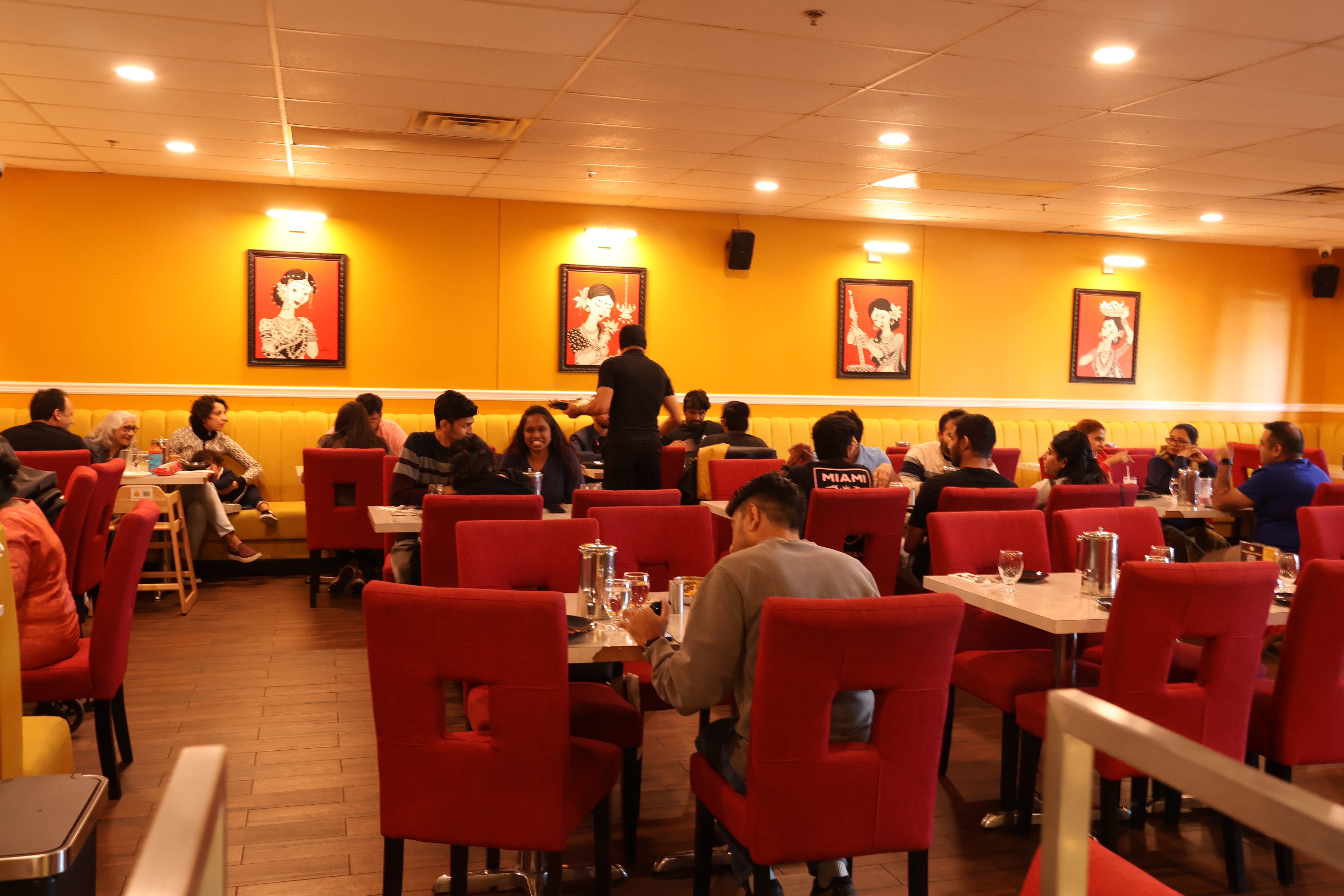 Luxurious restaurant interior with elegant table settings and warm lighting