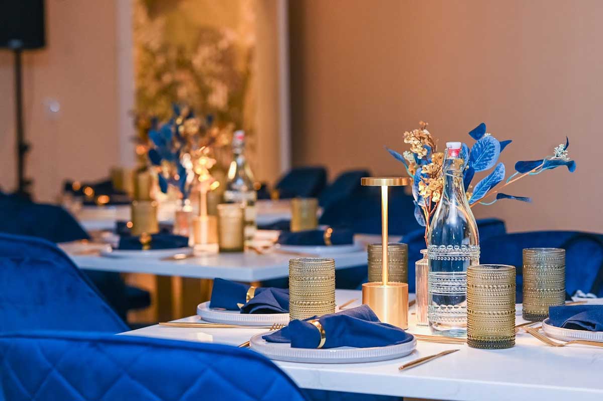 Mejwaani Party Hall - Elegant table setup and dining arrangements for 50 guests