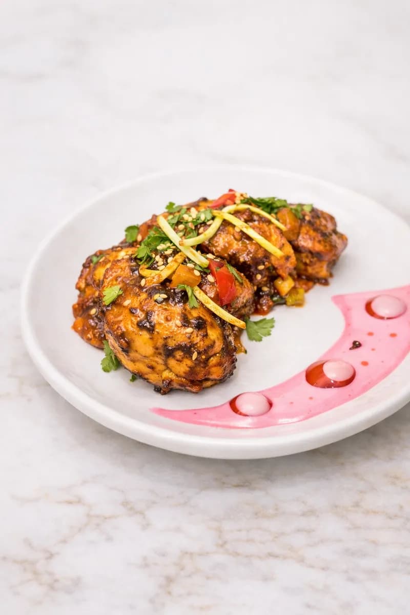 Crispy chicken starter plated at Mejwaani, ready for takeout orders in Edison NJ